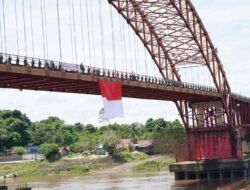 Bupati Murung Raya, Pengibaran Bendera Raksasa Wujud Nyata Sinergi Pemkab dan Masyarakat